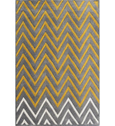 Modern chevron rug in gray, mustard yellow, and white.